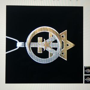 Gold and silver peace pendant with silver chain